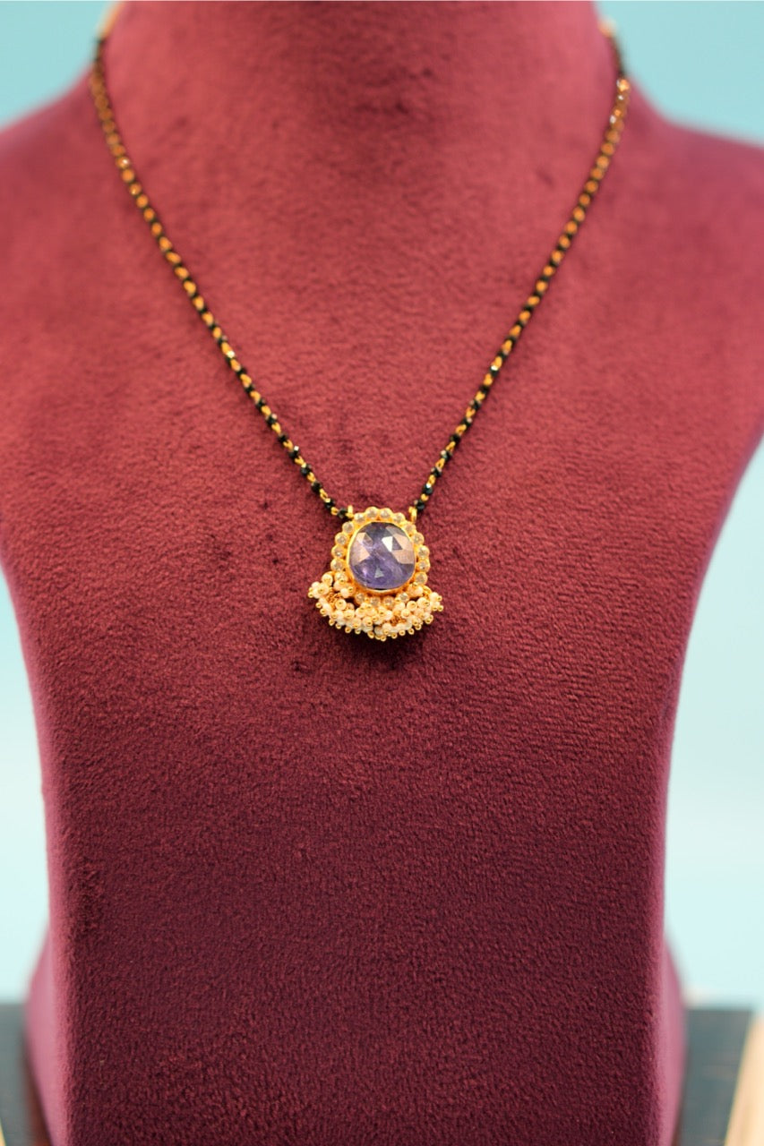 Lab grown stone with pearls